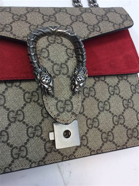 gucci gold bag disco|Gucci bag with snake buckle.